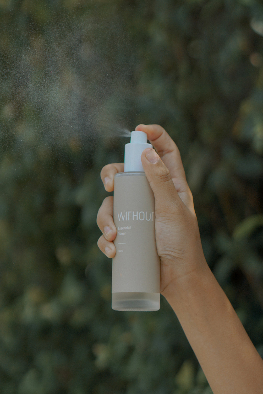 Essential Toner bottle with sleek, minimalist design on a clean, neutral background.